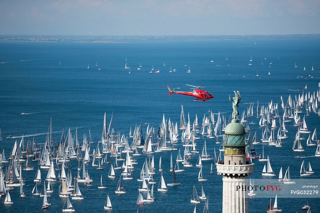 Helicopter on the top of the boats before the departure of Barcelona regatta, Trieste, Italy