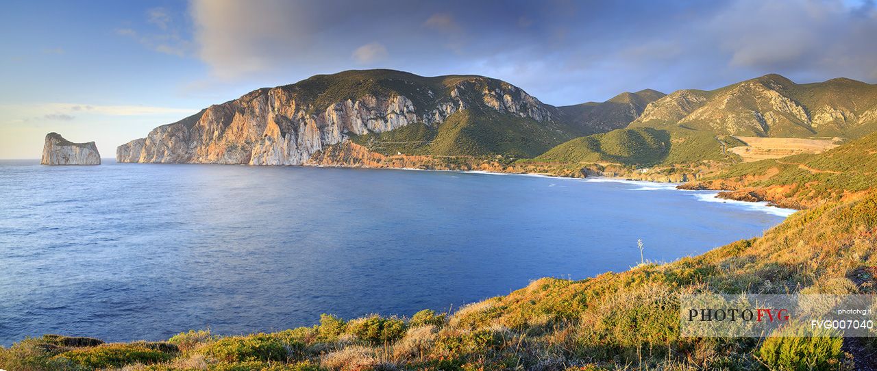 Panoramic view in location Masua, and in the background the well-known cliff of 