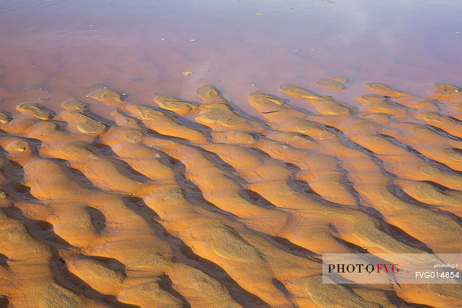 Detail of Piscinas dunes, the colors of a warm sunset, the dunes, the desert of Sardinia, a place full of magic, unique in the Mediterranean, Arbus, Sardinia, Italy