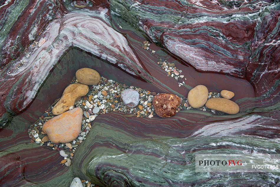 Pan di Zucchero a Masua is one of the most famous seascapes for the presence of a massive cliff just off the coast,
The colors of the rocks complete a magical framework full of mystical atmosphere, Masua, Sulcis-Iglesiente, Sardinia, Italy