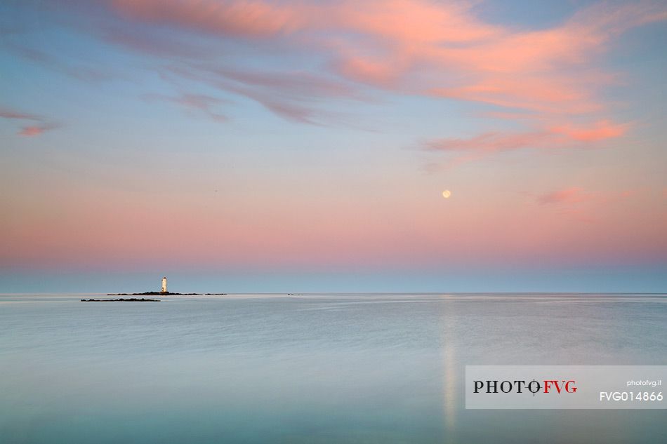 The Mangiabarche lighthouse overlooking the bay of the same name and is a point of interest for landscape photographers of the most famous in Sardinia, dawn or dusk or during a storm this pretty little bay is full of great energy, Sant'Antioco, Sulcis-Iglesiente, Sardinia, Italy