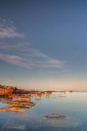 The Mangiabarche lighthouse overlooking the bay of the same name and is a point of interest for landscape photographers of the most famous in Sardinia, dawn or dusk or during a storm this pretty little bay is full of great energy, Sant'Antioco, Sulcis-Iglesiente, Sardinia, Italy The Mangiabarche lighthouse overlooking the bay of the same name and is a point of interest for landscape photographers of the most famous in Sardinia, dawn or dusk or during a storm this pretty little bay is full of great energy, Sant'Antioco, Sulcis-Iglesiente, Sardinia, Italy