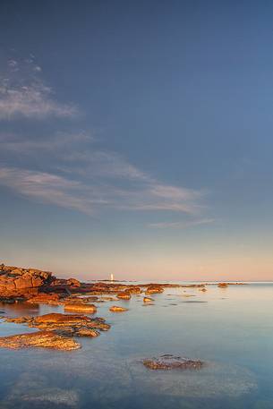 The Mangiabarche lighthouse overlooking the bay of the same name and is a point of interest for landscape photographers of the most famous in Sardinia, dawn or dusk or during a storm this pretty little bay is full of great energy, Sant'Antioco, Sulcis-Iglesiente, Sardinia, Italy