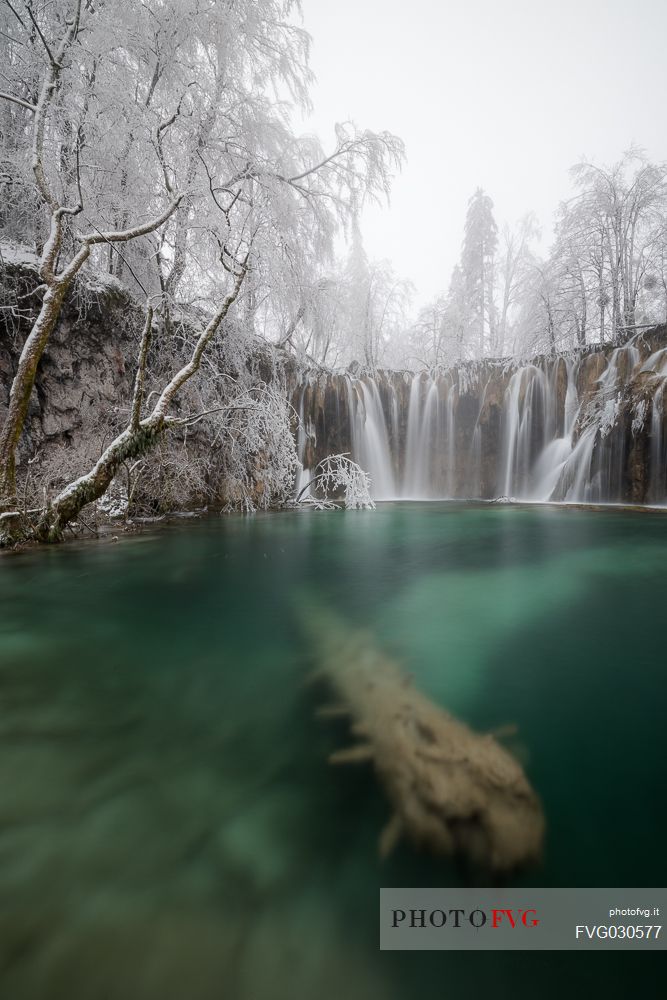 Winter waterfall in Plitvice Lakes National Park, Lika-Senj County, Karlovac County, Croatia.