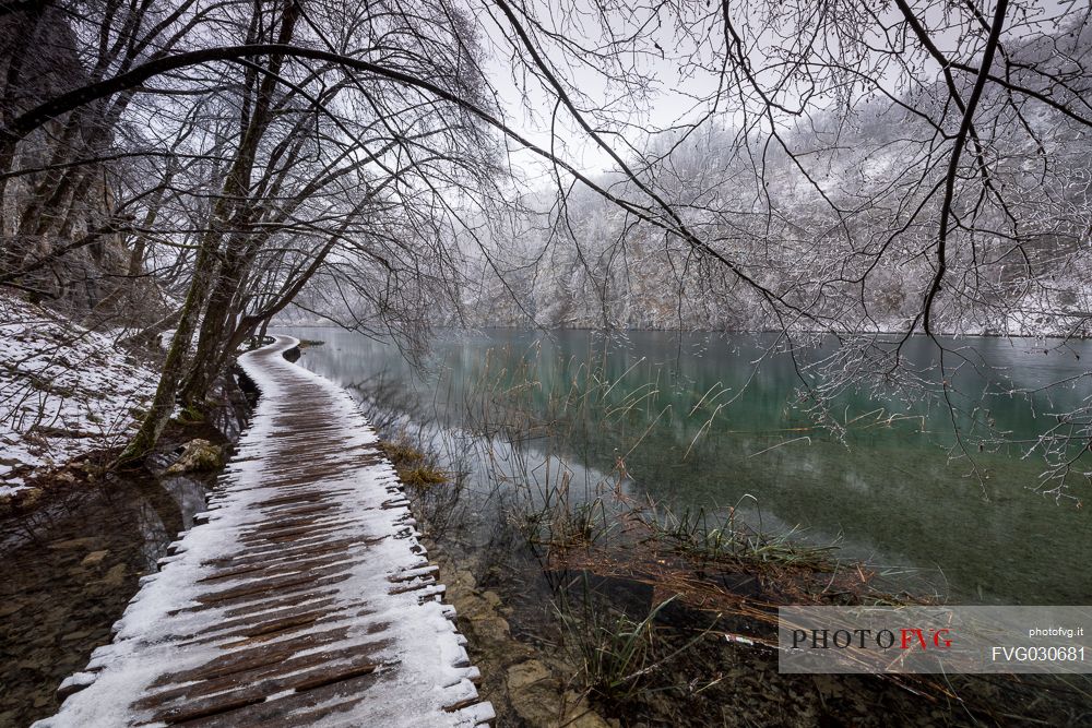 Winter path in Plitvice Lakes National Park, Lika-Senj County, Karlovac County, Croatia.