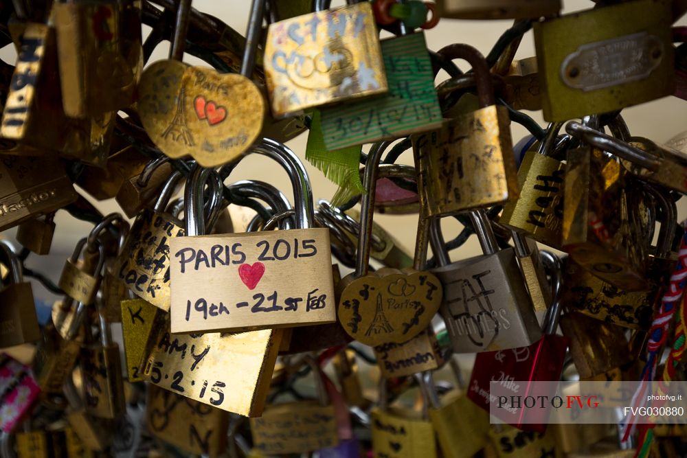 Love locks hanging in the Pont Neuf, Ile de la Cite, Paris, France.