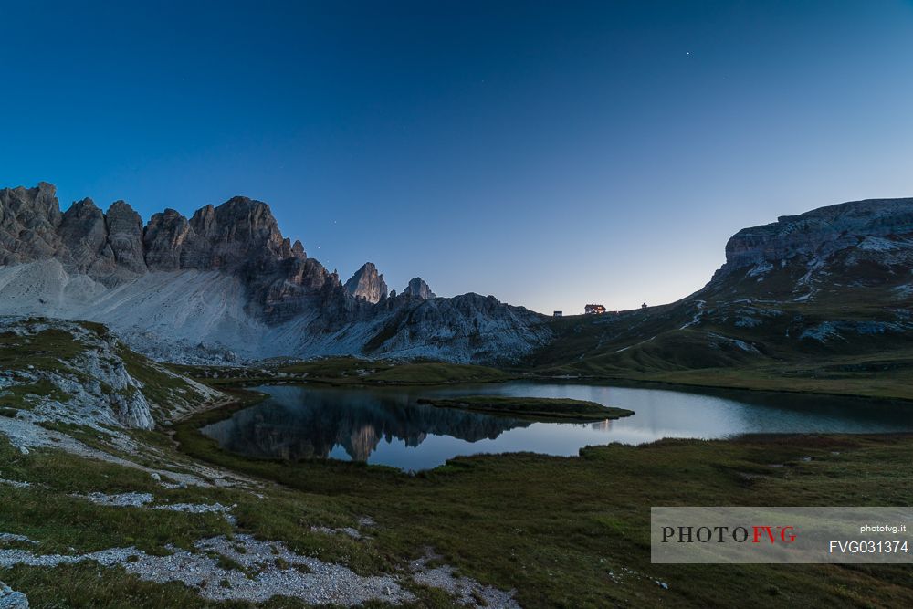 The Laghi dei Piani lake and the Locatelli hut near Tre Cime di Lavaredo, Sexten Dolomites, Italy.