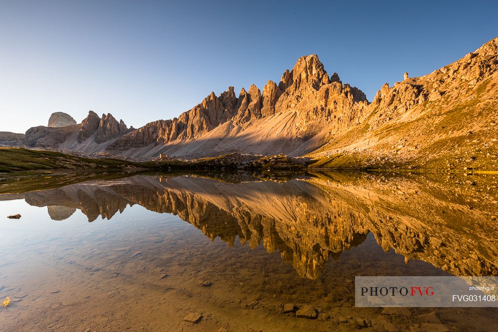 Sunrise at The Laghi dei Piani lake near Tre Cime di Lavaredo peak, Sexten Dolomites, Tre Cime natural park, Italy