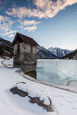 Wintertime to the Lago di Cave del Predil, lake Tarvisio, Udine, Italy