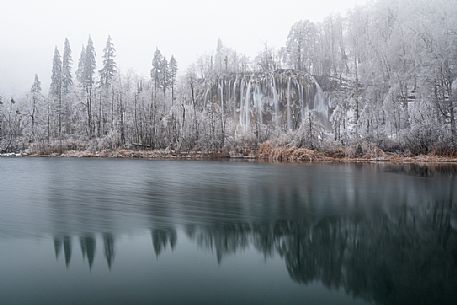 Winter waterfall in Plitvice Lakes National Park, Lika-Senj County, Karlovac County, Croatia.