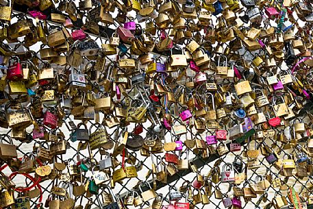 Love locks hanging in the Pont Neuf, Ile de la Cite, Paris, France.