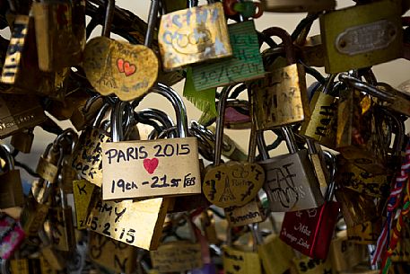 Love locks hanging in the Pont Neuf, Ile de la Cite, Paris, France.