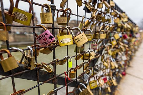 Love locks hanging in the Pont Neuf, Ile de la Cite, Paris, France.