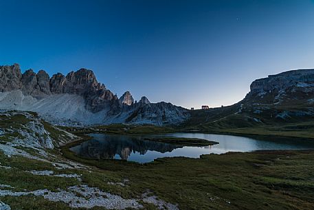 The Laghi dei Piani lake and the Locatelli hut near Tre Cime di Lavaredo, Sexten Dolomites, Italy.