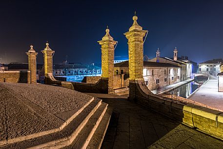 Details and reflections of Triple bridge, Ponte dei Trepponti bridge, called Ponte Pallotta, Comacchio town, Ferrara, Emilia Romagna, Italy