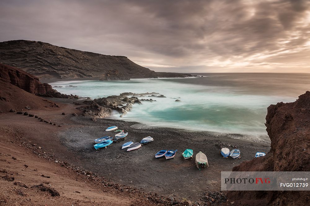 Sunset of the small marina of El Golfo, Lanzarote, Canary islands, Spain, Europe
