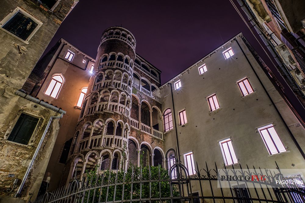 Night view of Scala Contarini del Bovolo spiral staircase, Venice, Italy, Europe