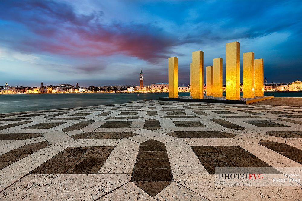 The Sky Over Nine Columns, sculpture of  Heinz Mack, and in the background the historic buildings of Venice and the Campanine San Marco bell tower, San Giorgio island, Venice, Italy, Europe