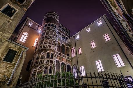 Night view of Scala Contarini del Bovolo spiral staircase, Venice, Italy, Europe