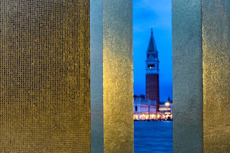 Glimpse on San Marco bell tower from The Sky Over Nine Columns sculpture at twilight, San Giorgio island, Venice, Italy, Europe Glimpse on San Marco bell tower from The Sky Over Nine Columns sculpture at twilight, San Giorgio island, Venice, Italy, Europe
