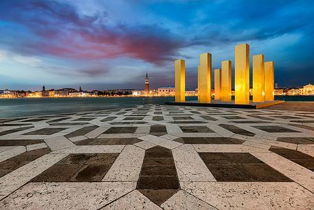 The Sky Over Nine Columns, sculpture of  Heinz Mack, and in the background the historic buildings of Venice and the Campanine San Marco bell tower, San Giorgio island, Venice, Italy, Europe