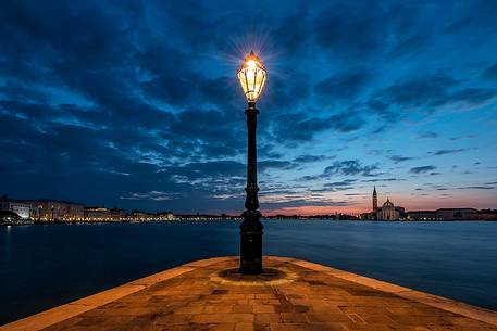 View of the historic palaces of Venice from Punta della Dogana at twilight, Venice, Italy, Europe