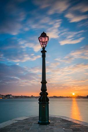 View of the historic palaces of Venice from Punta della Dogana at sunrise, Venice, Italy, Europe