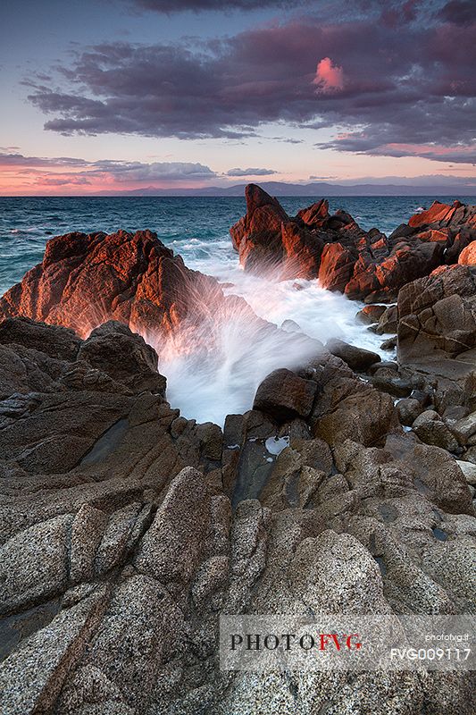 The essence of water and light captured during a winter sunset on the cliffs of Briatico Marina