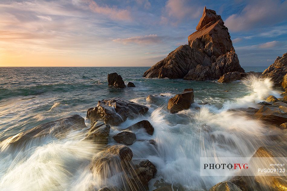 The Pizzuta Rock in Parghelia, illuminated by the golden light of sunset