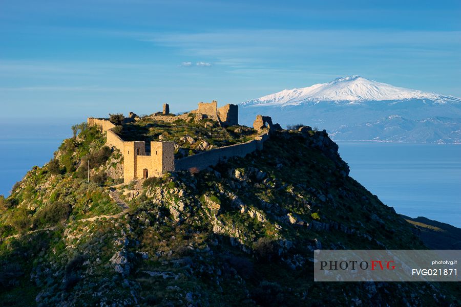 Castle of Sant'Aniceto, Sicily with Monti Peloritani and Mount Etna in background, Motta San Giovanni, Calbria, Italy