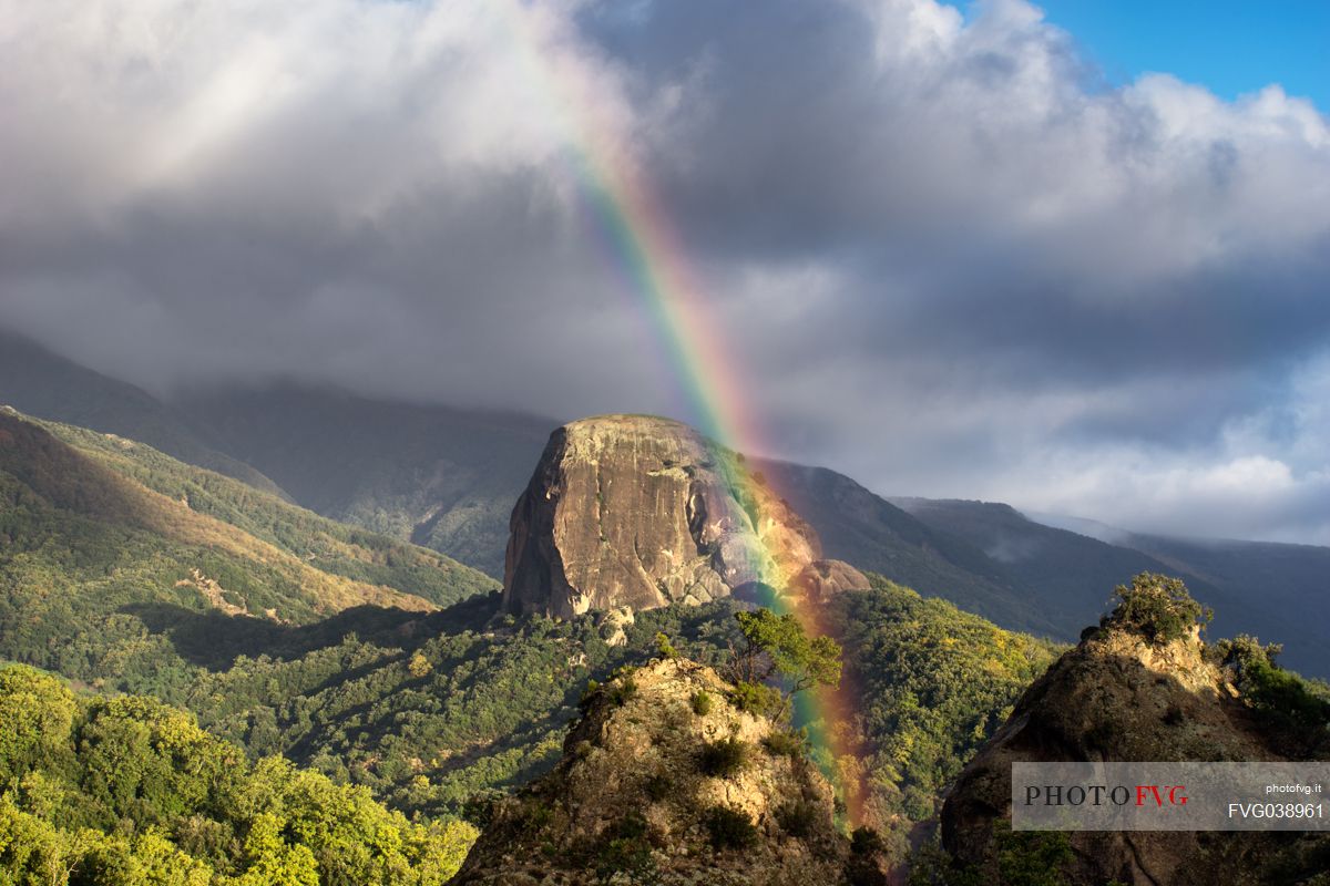 Pietra Cappa rock and rainbow, Aspromonte national park, Calabria, Italy, Europe