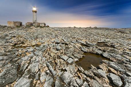 The lighthouse on the cliffs of Capo Murro di Porco, Plemmirio Natural Reserve