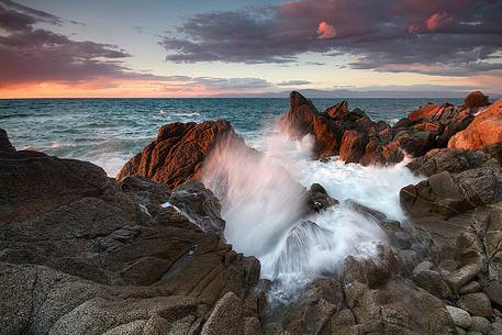 The essence of water and light captured during a winter sunset on the cliffs of Briatico Marina