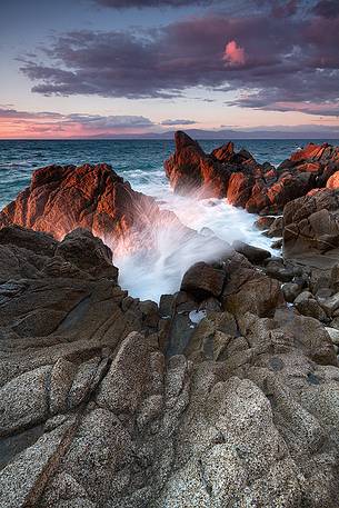 The essence of water and light captured during a winter sunset on the cliffs of Briatico Marina