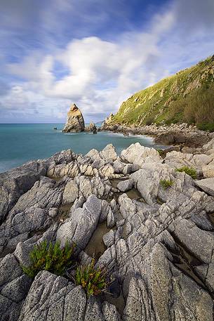 The Pizzuta Rock in Parghelia, illuminated by the golden light of sunset