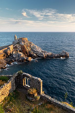 The Church of San Pietro in Porto Venere illuminated by the golden light of the sunset, La Spezia, Liguria, Italy, Europe