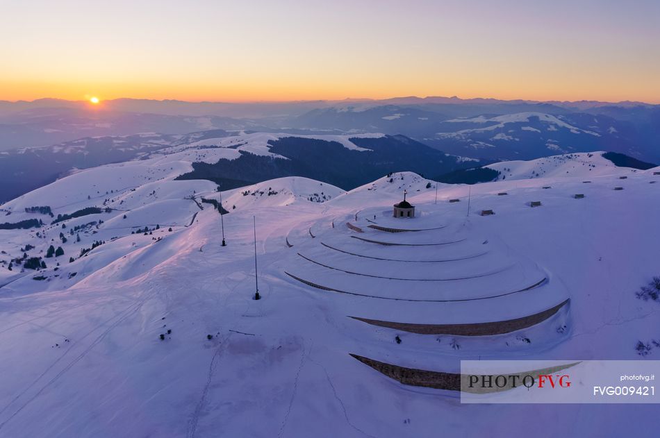 Ossuary to the fallen of Cima Grappa in the depths of winter at sunset