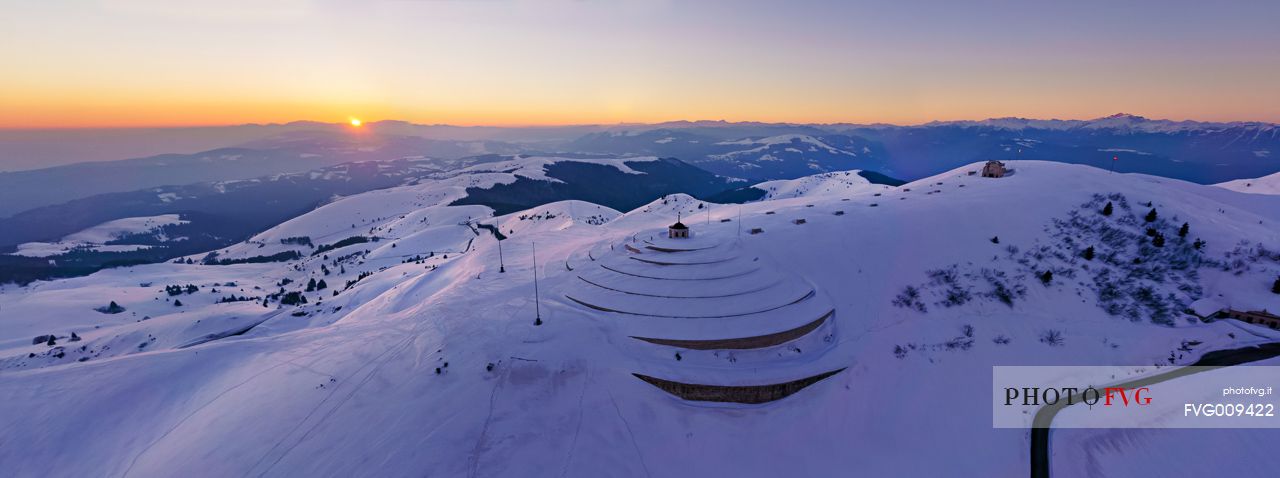 Ossuary to the fallen of Cima Grappa in the depths of winter at sunset