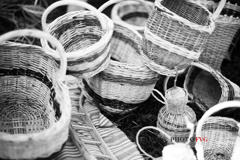 Artisan creates wicker baskets