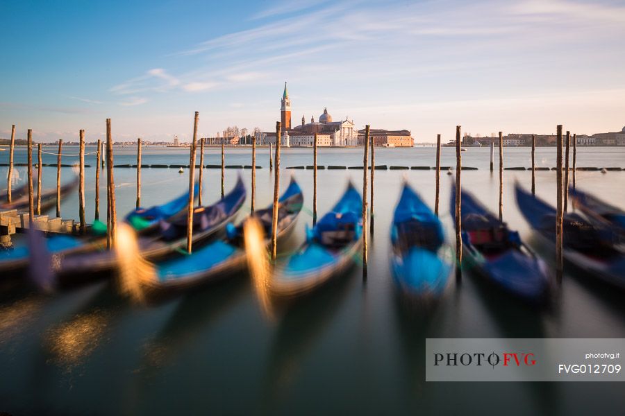 Gondolas at sunset, in the background the Church of San Giorgio Maggiore