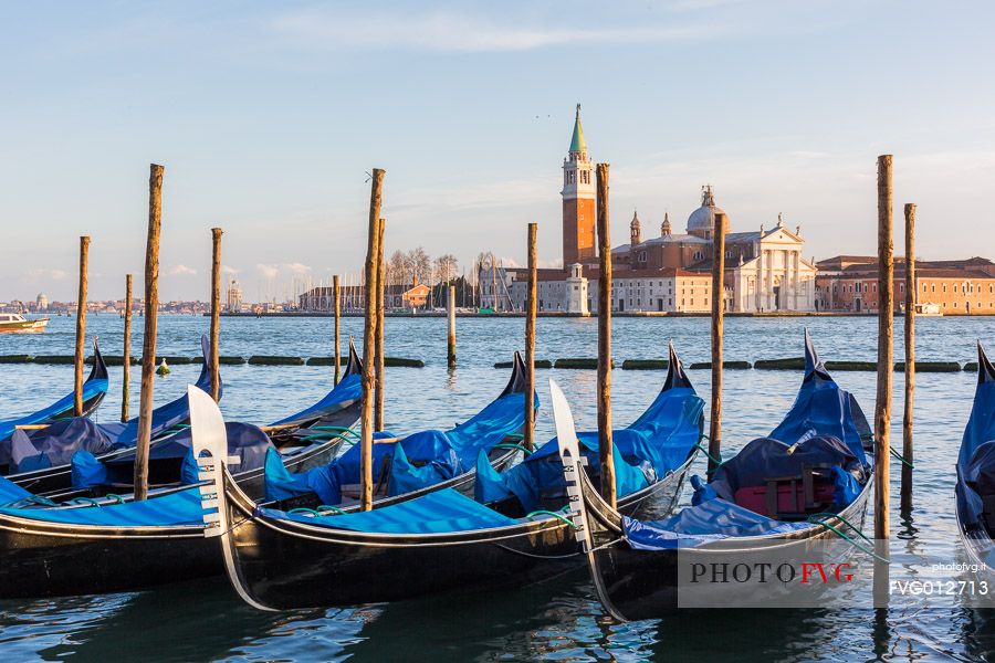 Gondolas at sunset, in the background the Church of San Giorgio Maggiore