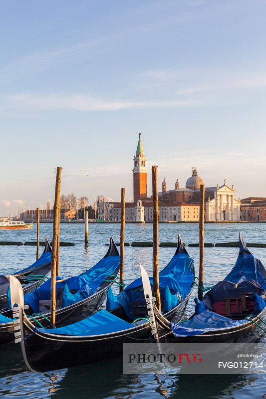 Gondolas at sunset, in the background the Church of San Giorgio Maggiore