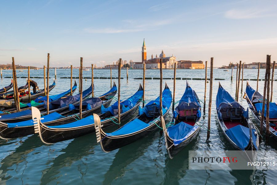 Gondolas at sunset, in the background the Church of San Giorgio Maggiore