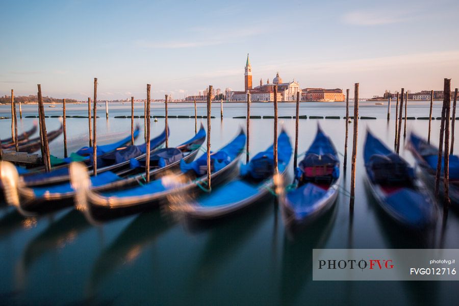 Gondolas at sunset, in the background the Church of San Giorgio Maggiore