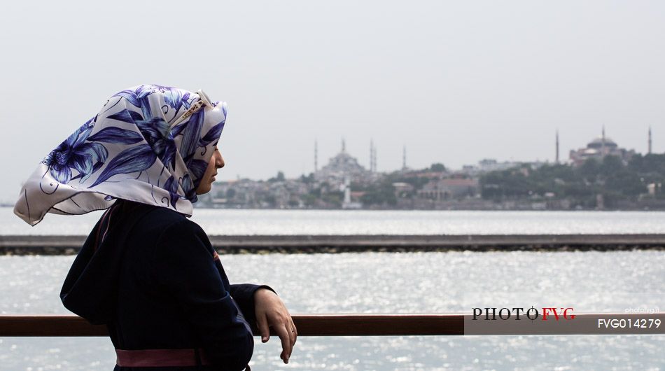 Woman looks Bosphorus strait