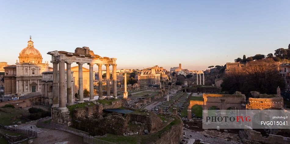Sunset light on the Roman Forums, the Colosseum in the background