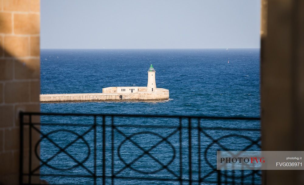 St. Elmo Breakwater Lighthouse, Grand Harbor, La Valletta, capital city of the island of Malta.