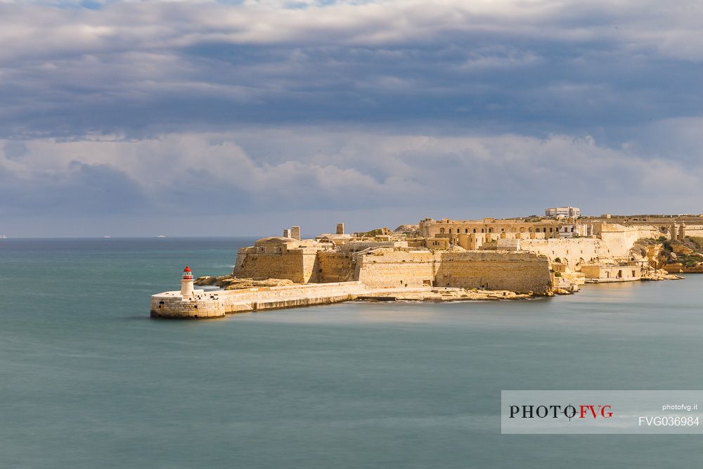 Lighthouse breakwater and defenses of Fort Rikasoli, Valletta, Malta