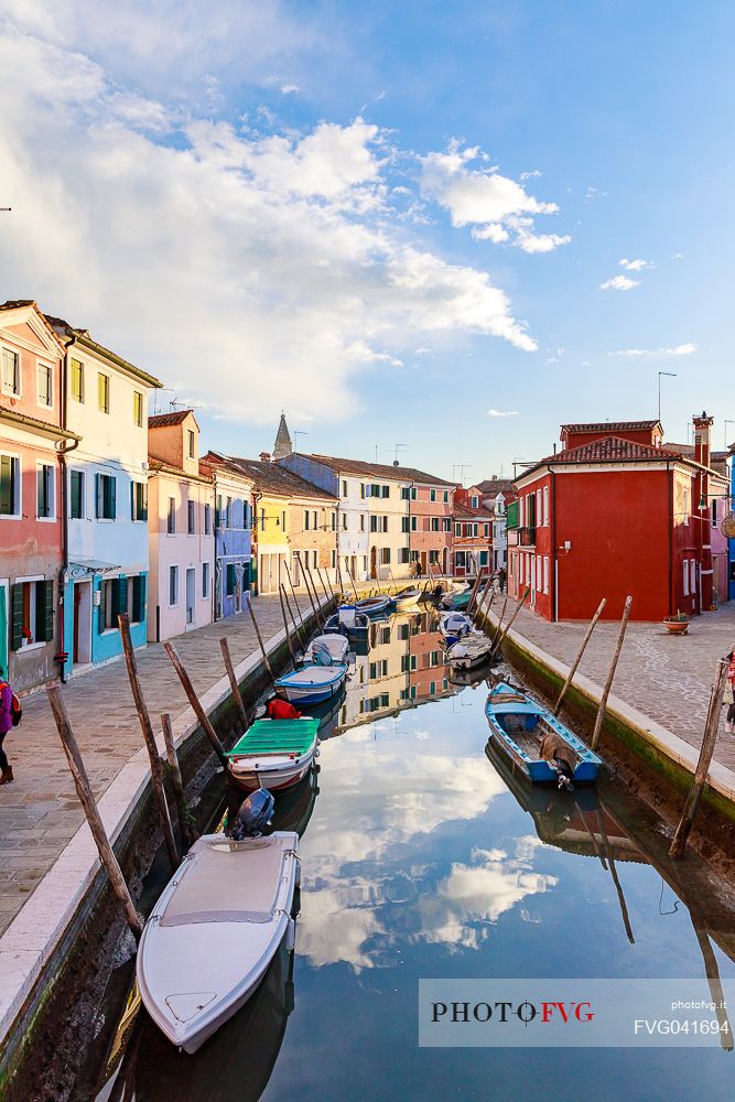 Colorful houses in Burano with canal and moored boats, Venice, Venetian lagoon, Veneto, Italy, Europe