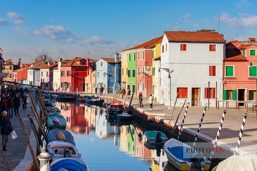 Colorful houses in Burano with canal and moored boats, Venice, Venetian lagoon, Veneto, Italy, Europe